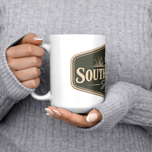 Southern_Crest_Duck_Mug_15ozWhiteMugLifestyleLHChest_Mockup.png_15966858