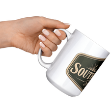 Southern_Crest_Duck_Mug_15ozWhiteMugLifestyleLHRaisedAngle_Mockup.png_15966859