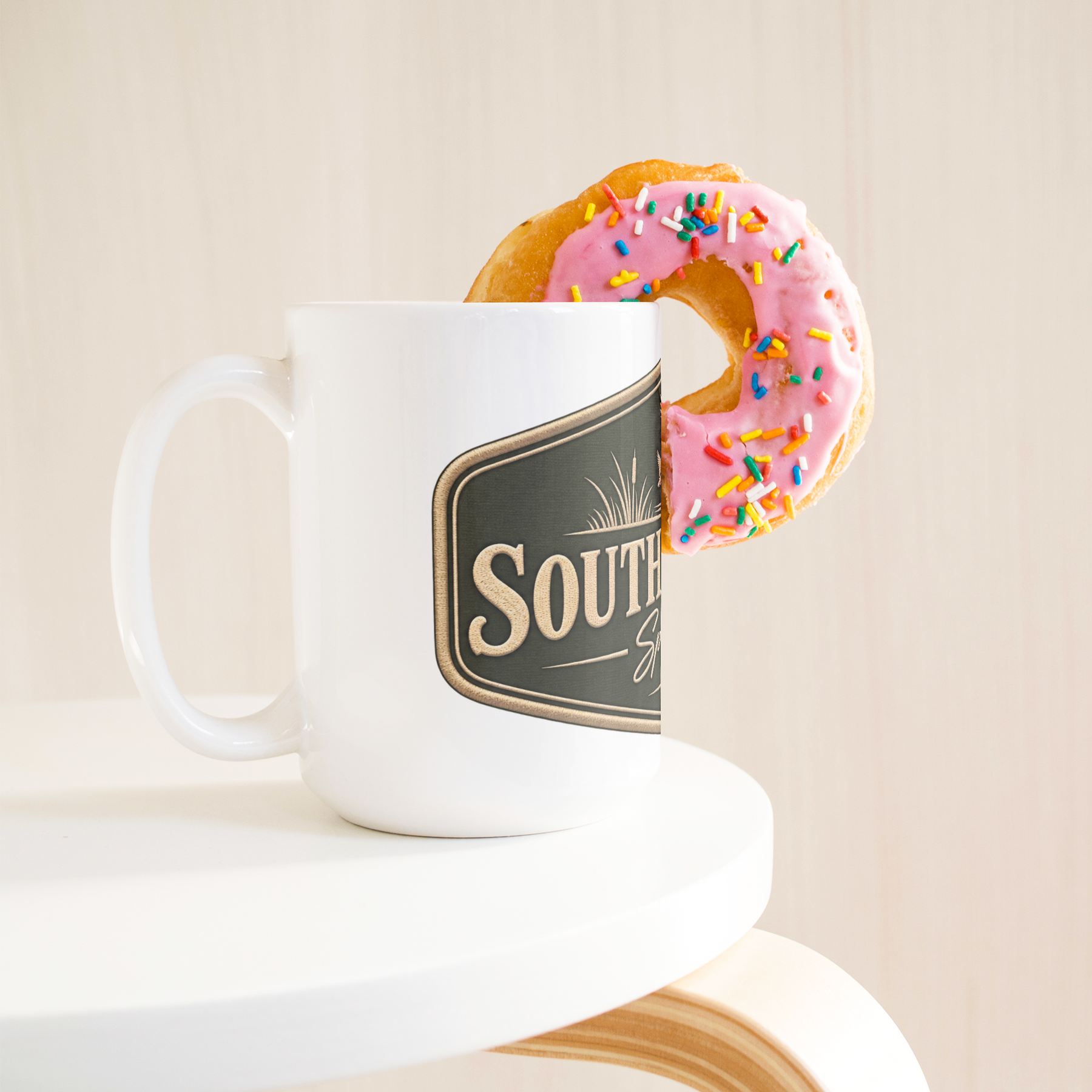 Southern_Crest_Duck_Mug_15ozWhiteMugLifetsyleDonutLH_Mockup.png_15966857